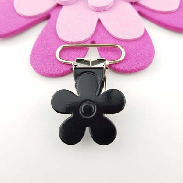 Clips till napphållare svart blomma